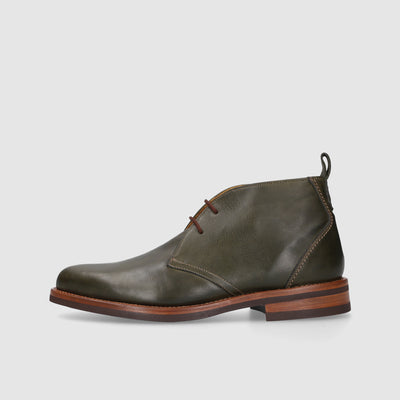 Text: Handcrafted men's boots